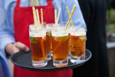 4 glasses of pimms on a tray